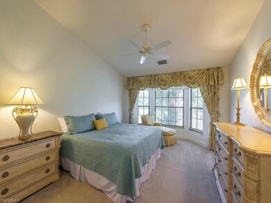 Master bedroom with walk-in closet and bay window 