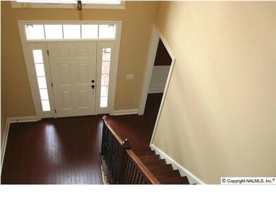 The 2 story foyer provides a dramatic entrance to this upscale home