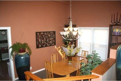 DINING ROOM IS INVITING AND STUNNING WITH CATHEDRA