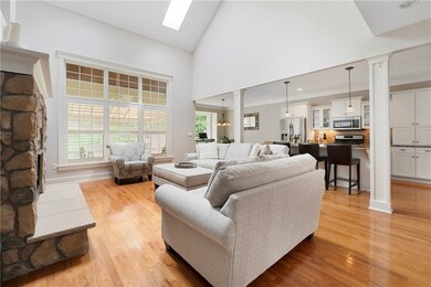 Family room open to kitchen ... custom white shutt