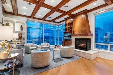 Gorgeous family room with floor to ceiling windows
