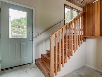 Mud room entry between home and...