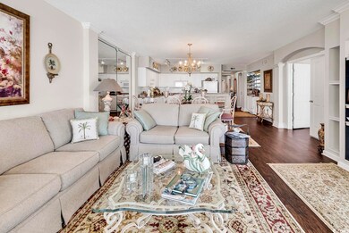 Living room with dark hardwood / wood-style floori