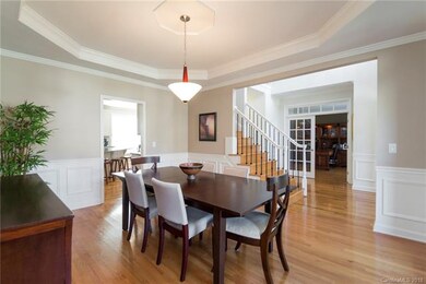 View of the foyer and office space from the formal