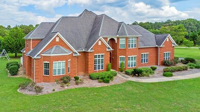 View of front of house featuring a front lawn