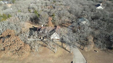 1.5 acres with amazing trees in The Woodlands of Parker County