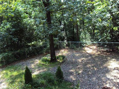 Exterior Back/Side. Other side of fenced backyard