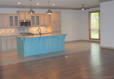 Living area open to kitchen and breakfast area noo