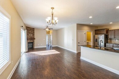 Dining Area open to Kitchen and Family Room & Bar 