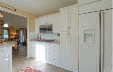 Kitchen Overlooks Family Room