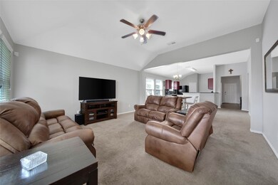 Large windows let in tons of natural light that accent the high ceilings.