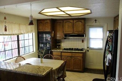 Upgraded Family Kitchen with Granite Countertops a