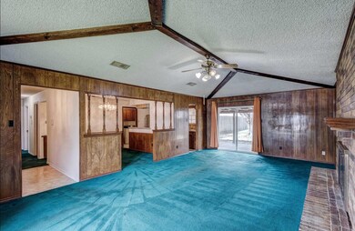 Oversized Living Room with wood beams