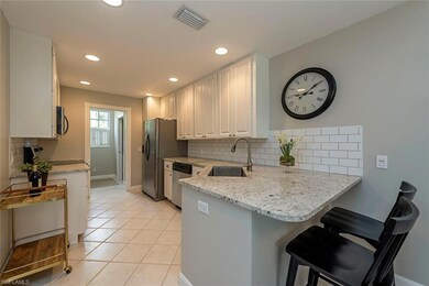 Open Kitchen with Stainless Appliances