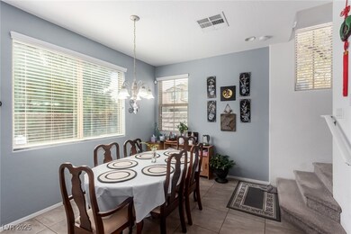 Dining space with visible vents, stairs, baseboard