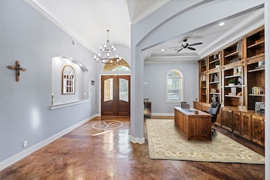 Upon entering the home the stained concrete floors
