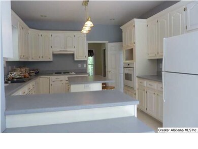 Kitchen with dishwasher, refrigerator, built-in ov