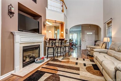 2 story living room with fireplace