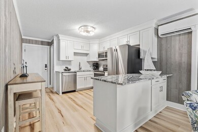 Kitchen featuring light hardwood / wood-style floo