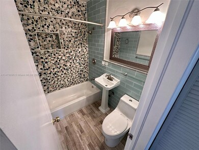 Located in hallway off living areas adjacent to the 2 bedrooms