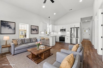 Think of the possibilities! Virtually staged :) Plenty of room for a dining room table as well