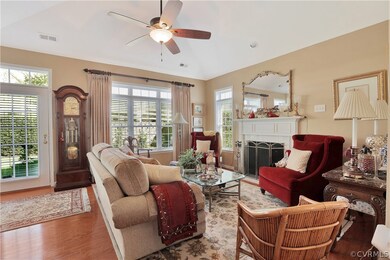Family room with gas fp, HW floors, door to rear p