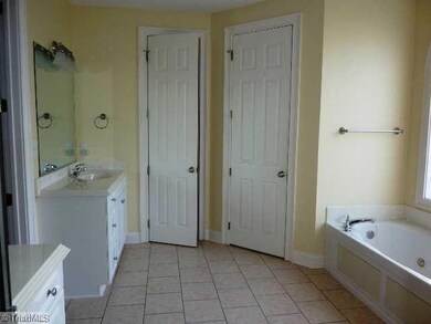 Master Bath/Spa. Separate vanities, double closets, jetted tub, large walk-in shower and private water closet.