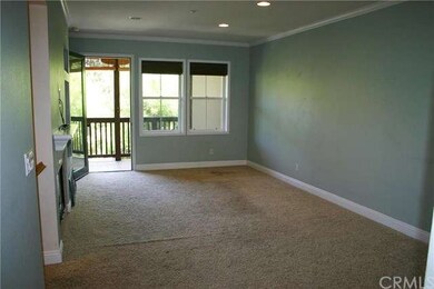 Family room with balcony, fireplace, crown molding