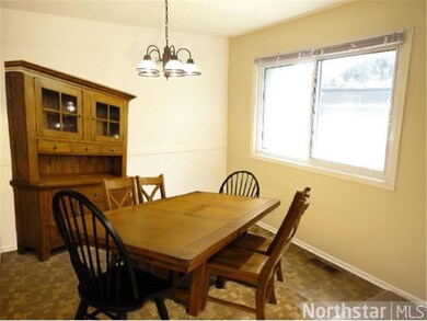 Delicious dining space. Newer light fixture in the
