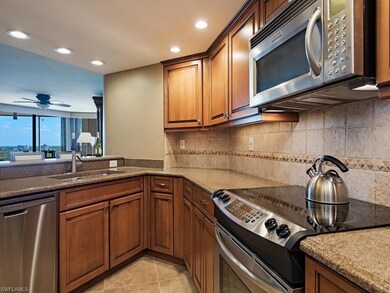 KITCHEN OPENS TO LIVING AREA