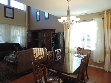 Formal Dining Room with Beautiful floors. With Beautiful window covering.