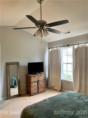 2 spacious master suites!  Ceiling fan and plenty of sunlight!