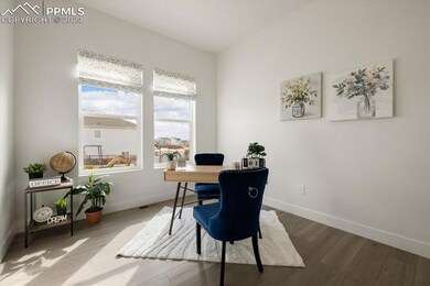 Office featuring hardwood / wood-style flooring