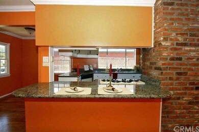 Breakfast bar opens to kitchen making entertaining