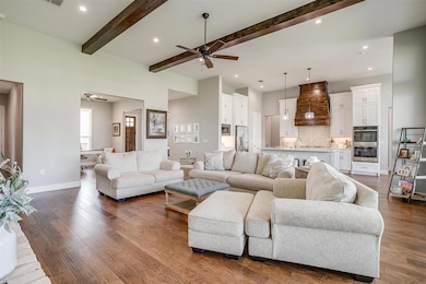 Living room with dark wood-type flooring, ceiling 