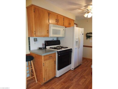 Fully applianced kitchen with oven, range, refrige
