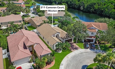 211 Cameron Ct, Weston, FL 33326 - photo 7