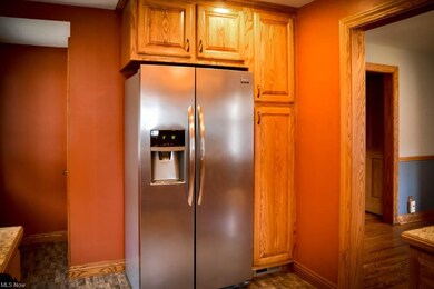 Kitchen has a pantry area.