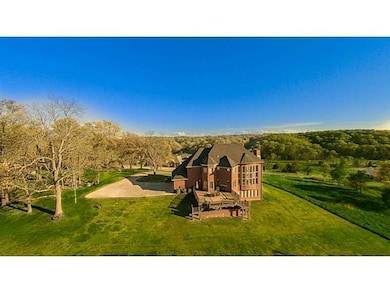 Exterior Back. With an almost 800 sq ft composite deck and enough flat space to play ball or put in a pool.