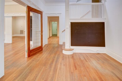 The front door opens to a charming entry space, fe
