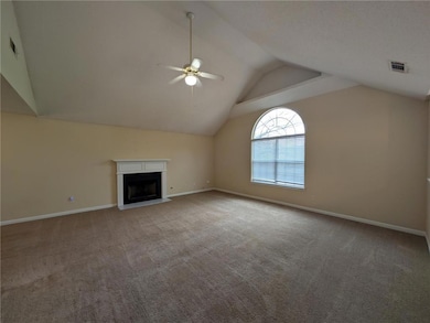 Unfurnished living room featuring carpet, ceiling 
