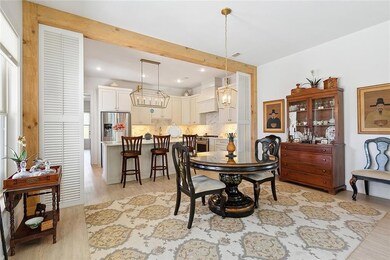 Gorgeous beams frame the dining area that leads to