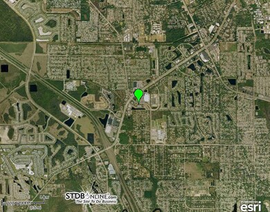 Just South of Dunlawton Ave.
