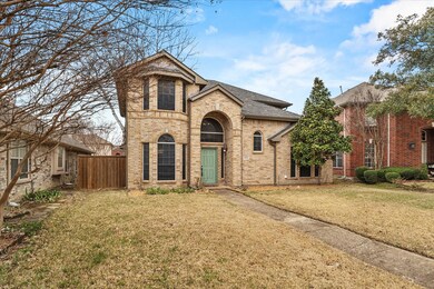 View of front of property with a front lawn