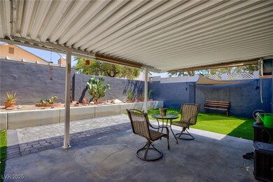 Fenced backyard featuring a patio