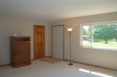 Spacious living room w/lg picture window for lots