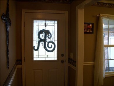 This home offers a nice foyer with hardwood flooring