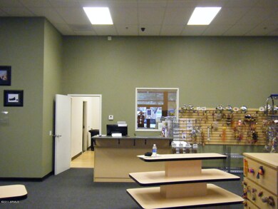 door to rear storage, office and 2 restr