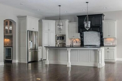 Open kitchen with private prep area w/ sink and pa