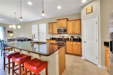 Popular open floor plan with large kitchen island.